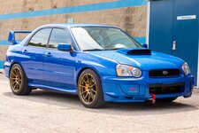 2004_subaru_impreza_wrx_sti_16243892890994c2522fcb1f2102004_subaru_impreza_wrx_sti_16223089118...jpg